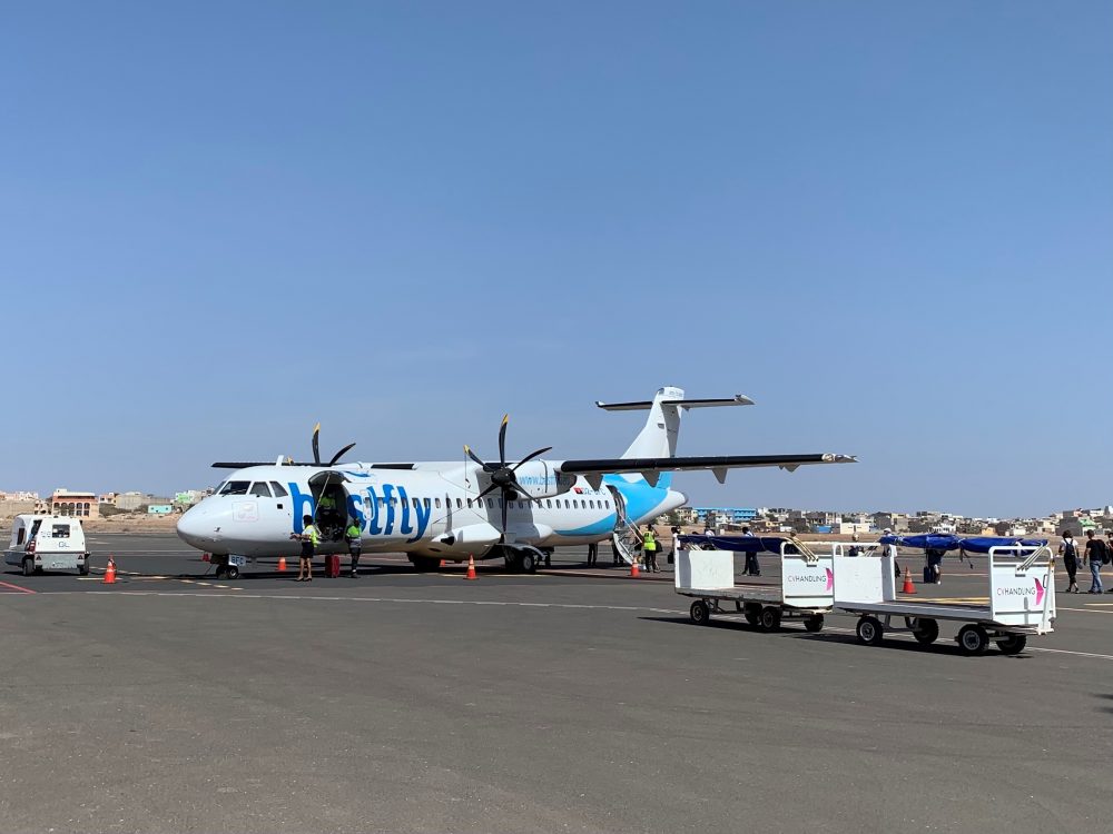 ATR72 plane from Best Fly being loaded on airport tarmac in Cabo Verde